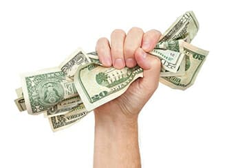 person holding some cash