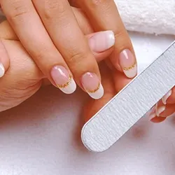 A person trying to pass the fingernail drug test